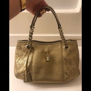 Carolina Herrera gold handbag